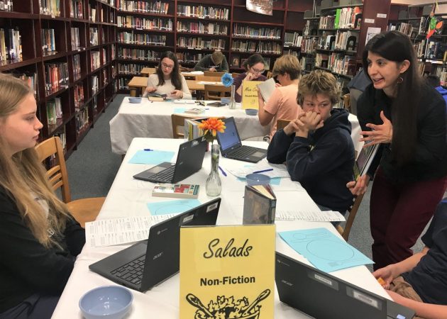 Librarian Julianne Ross gets the tasting started.