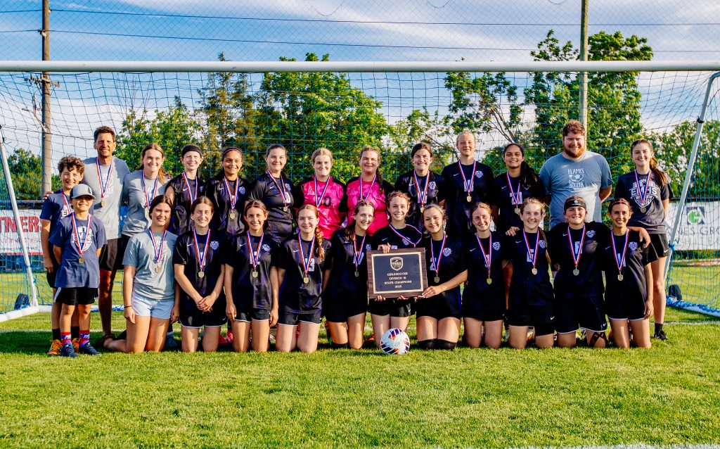 EMS-New Covenant WSCR Champs Eastern Mennonite poses for a photo after their state championship win against New Covenant.