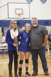 Maya Ferrell '20 with mom and dad, Sara and Joe