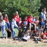Middle school science students helped install tires for the new EMES playground.