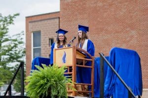 Emma Myers and Maggie Fairfield, commencement 2021