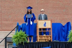 Rahel Lema and Princiipal Justin King, commencement 2021