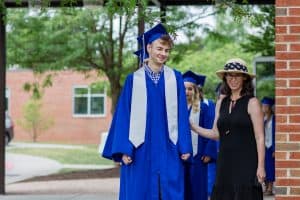 Isaac Deavers and Jodi Hertlzer, class sponsor, commencement 2021