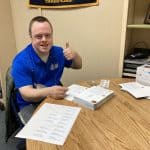 Volunteer Steve Martin stamped and addressed hundreds of cards