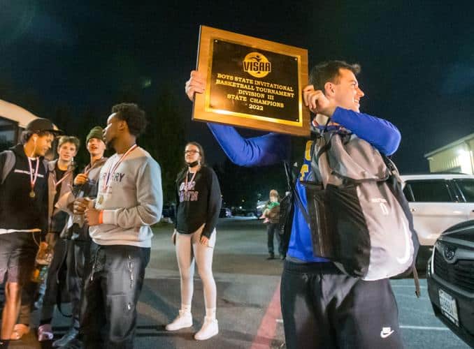 Fans gather to welcome home the state championship Flames. Photo by Daniel Lin/DN-R