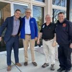 After a Mennonite Disaster Service chapel: MDS, Justin King (high school principal), Kevin King (Justin's dad and executive director of MDS), Phil Helmuth (MDS), Paul Helmuth (Phil's son and local emergency coordinator)