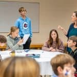 Ms. Blosser working with this year's fund drive students